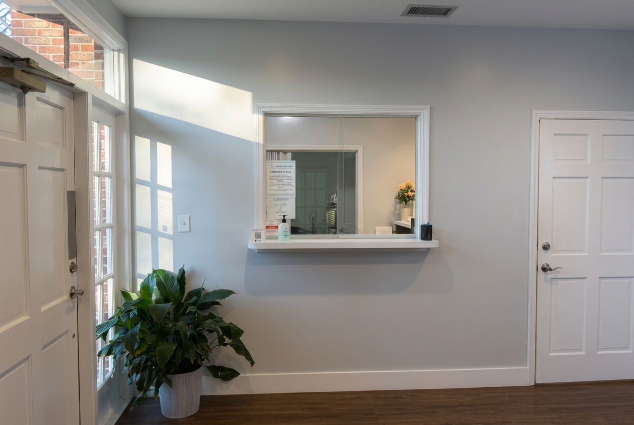 Reception window and entrance inside the Mount Pleasant office