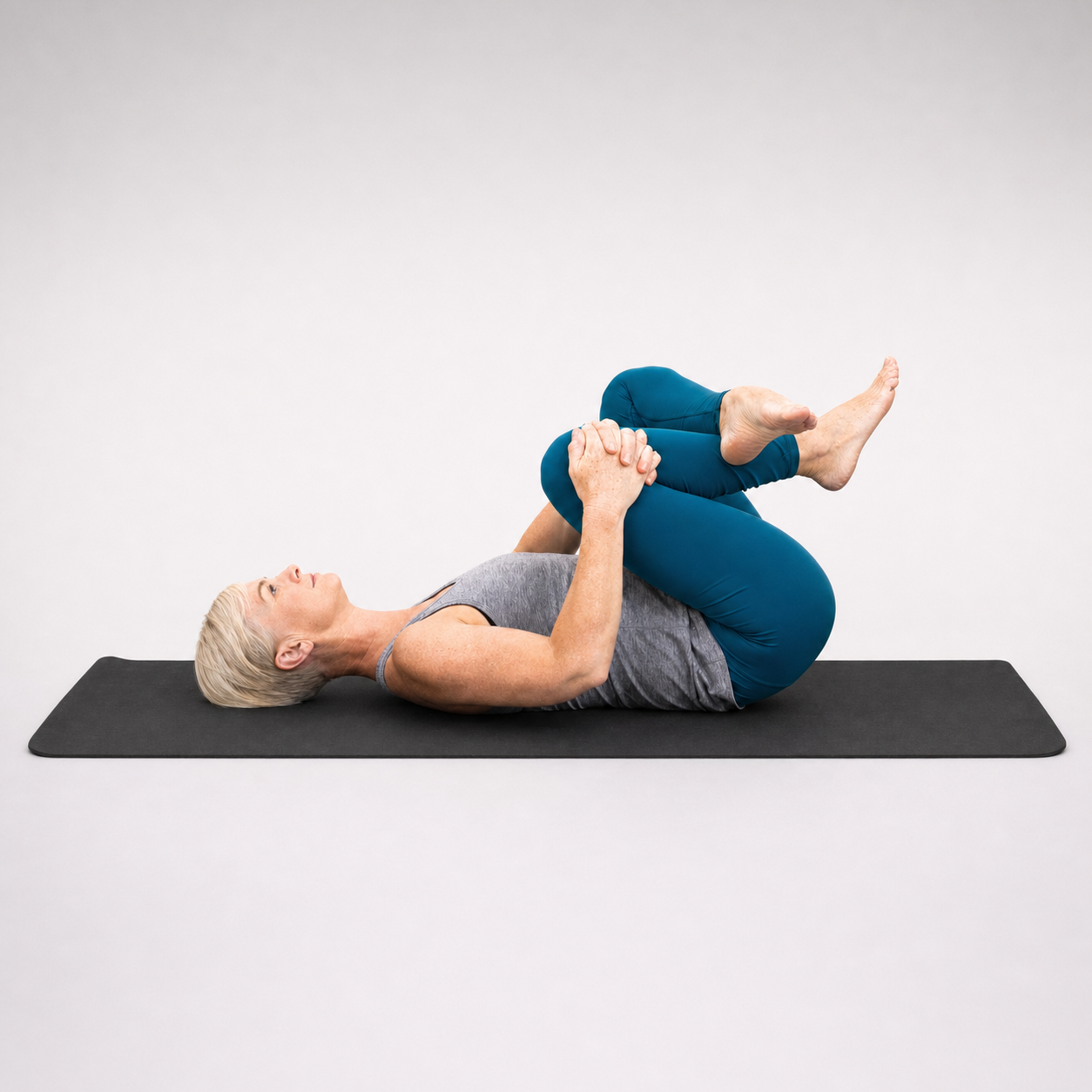Supine figure-4 hip stretch, ankle crossed over knee