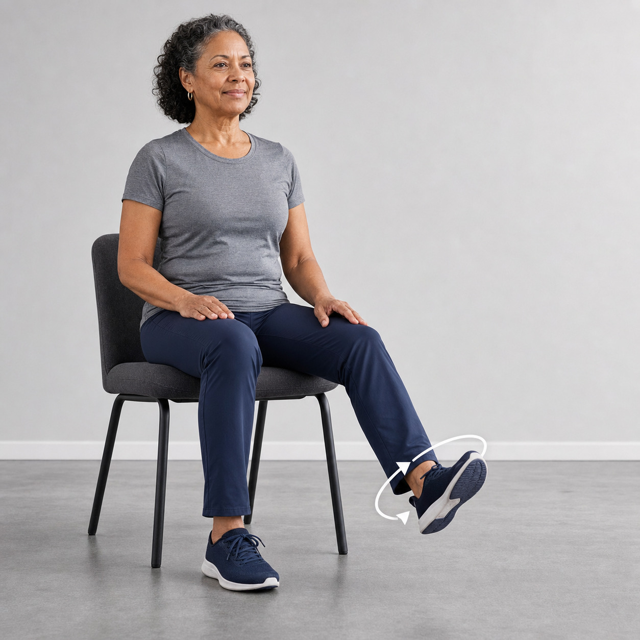 Seated ankle alphabet exercise with the foot lifted off the floor
