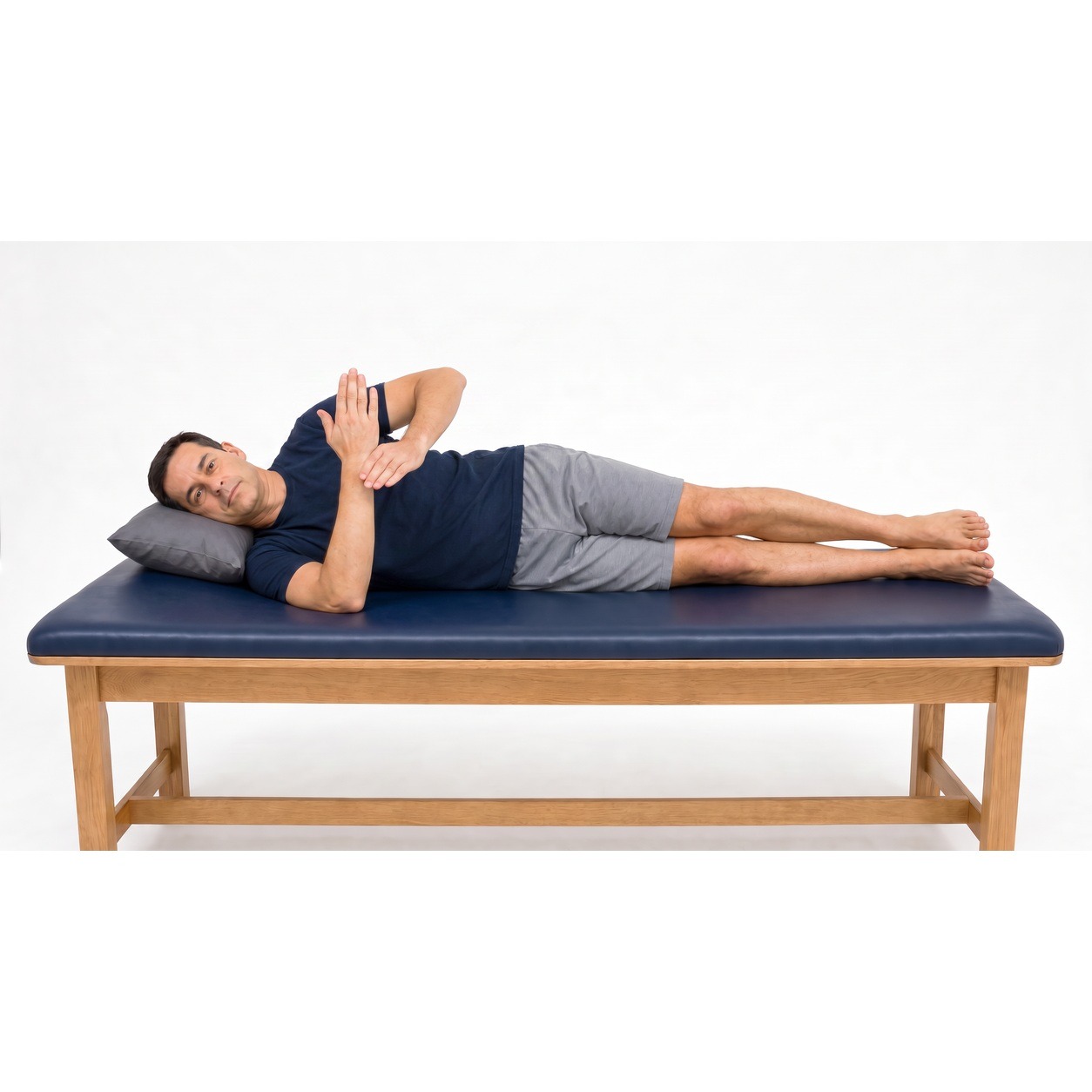 Sleeper stretch starting position with forearm elevated