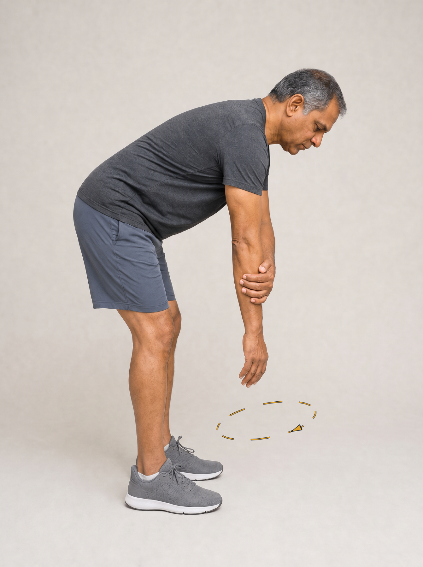 Bent-over passive shoulder pendulum exercise with the arm hanging relaxed
