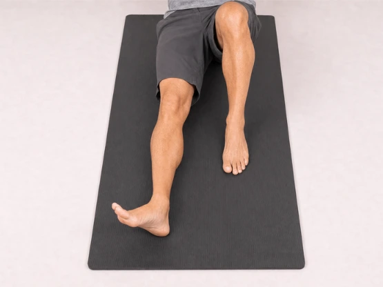 Overhead view of the straight leg rotated outward from the hip for the toes-out variation