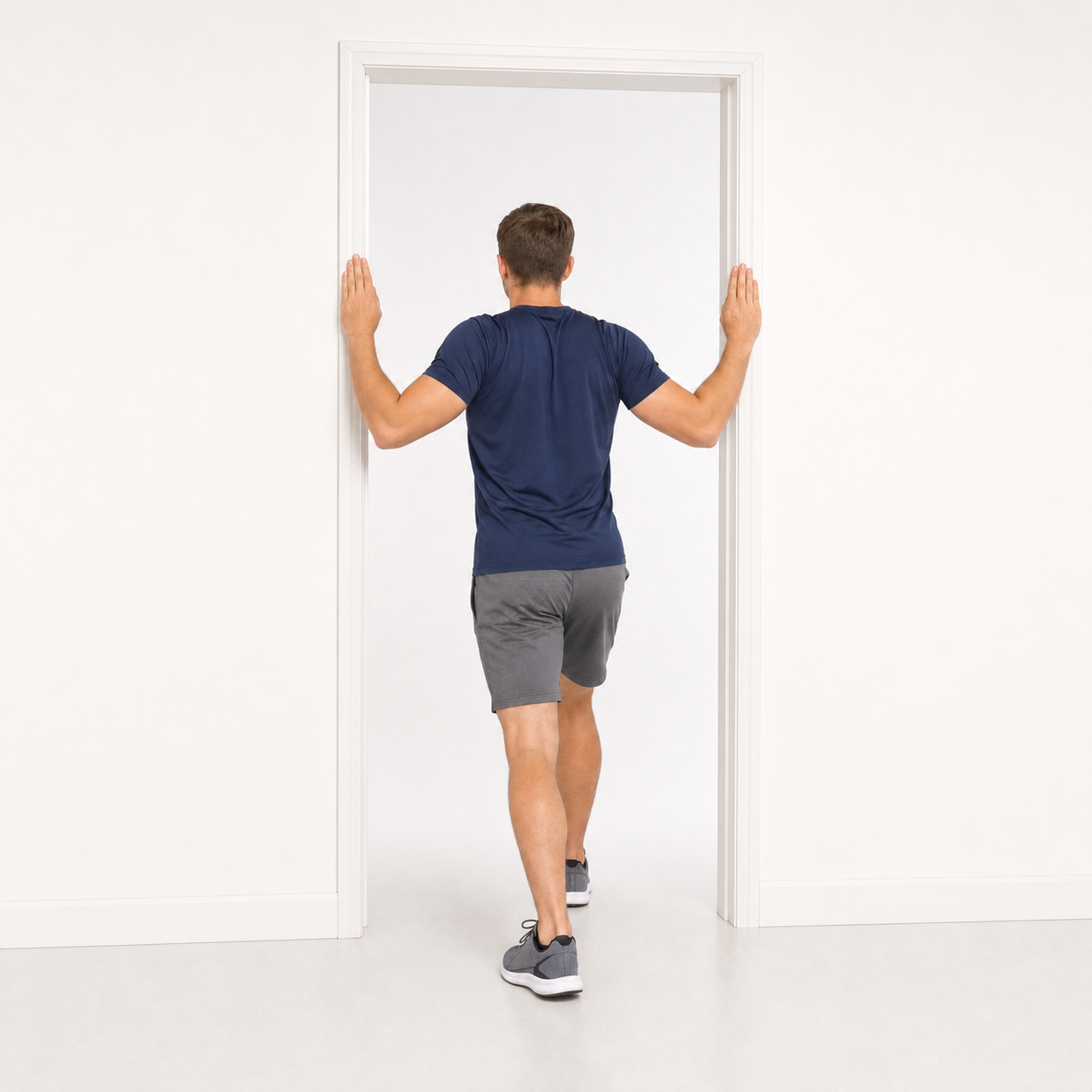 Doorway chest stretch with forearms on the door frame